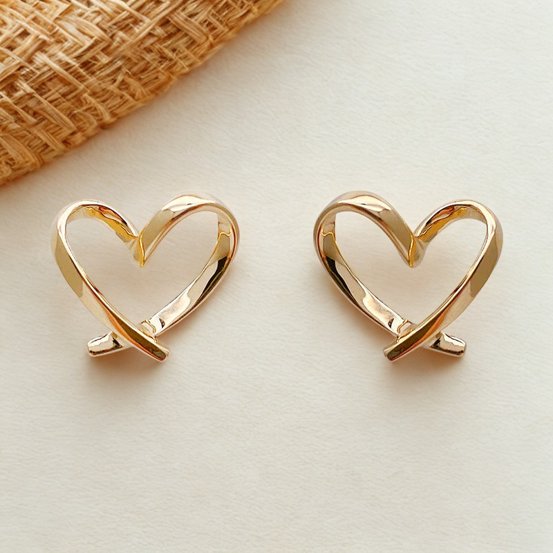 Radiant Heart Glow Studs